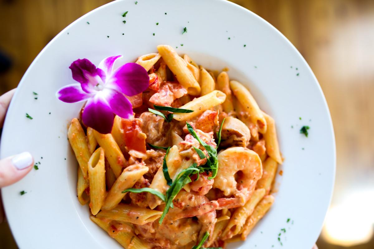 15 Point Road Seafood Pasta with decorative flower